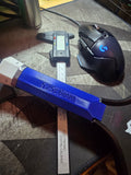 Blue grip panel stamped 5.25s 6mm beside a digital caliper