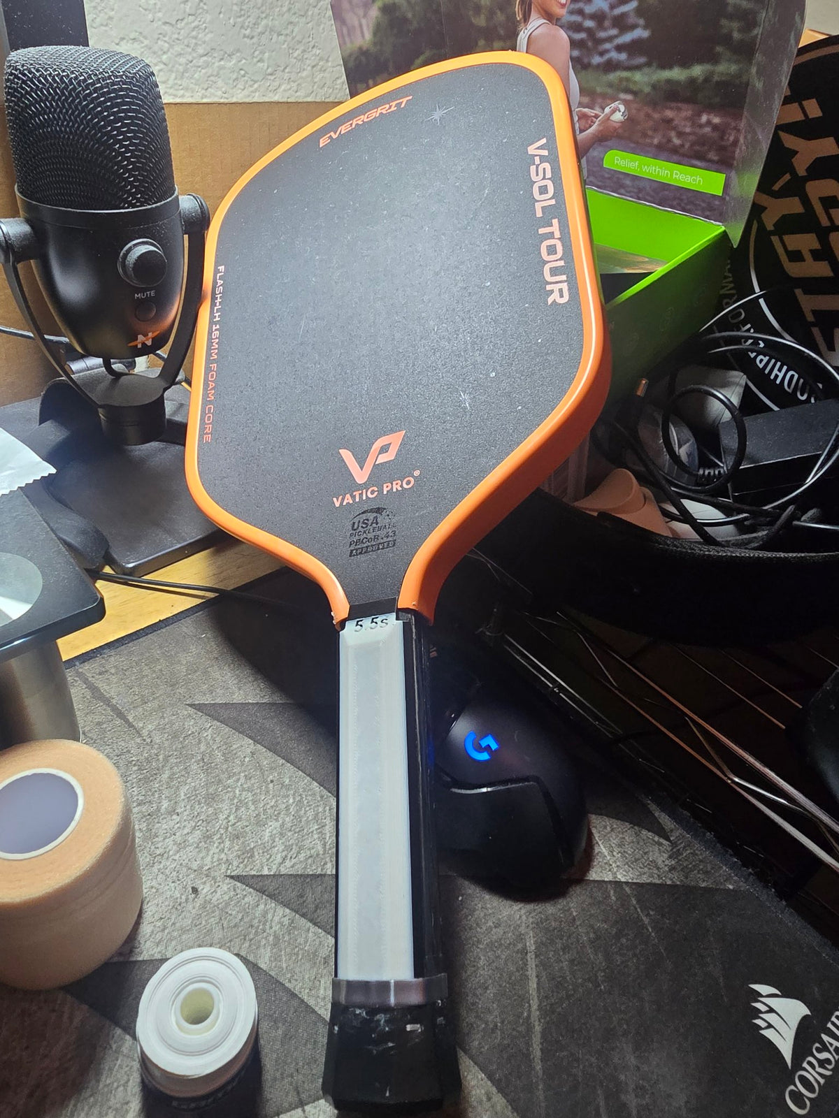 Vatic Pro paddle with a translucent white grip panel installed, stamped 5.5s