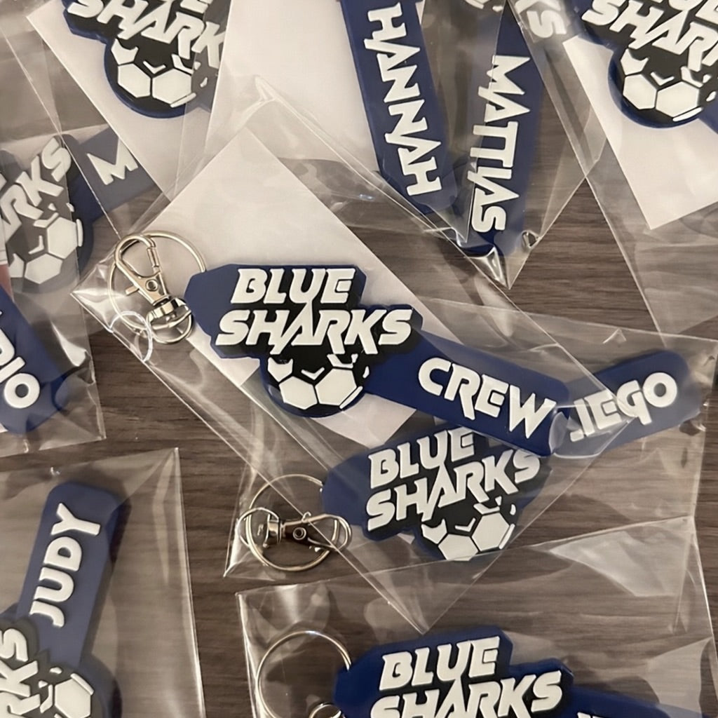 Packaged BLUE SHARKS team name keychains