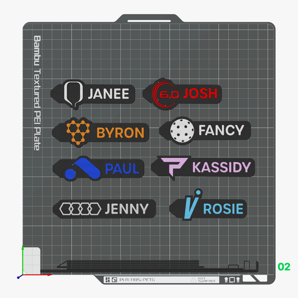 Sample personalized name tag keychains — eight tags with different names and icons